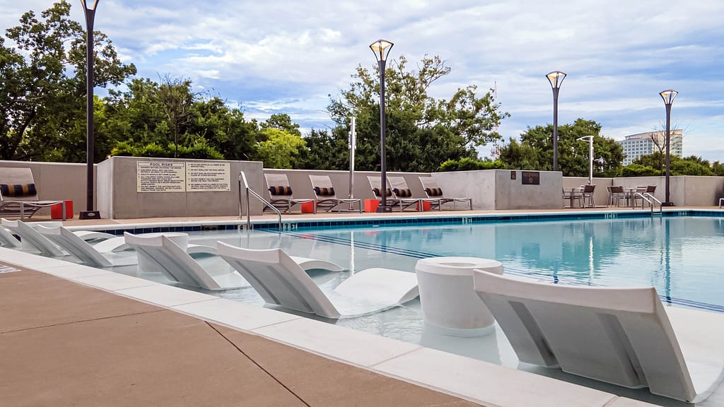 aria atlanta ki drone 003 - atlanta's commercial photographer drone photograph of lounge chairs by a pool at aria atlanta taken by drone photographer karen images