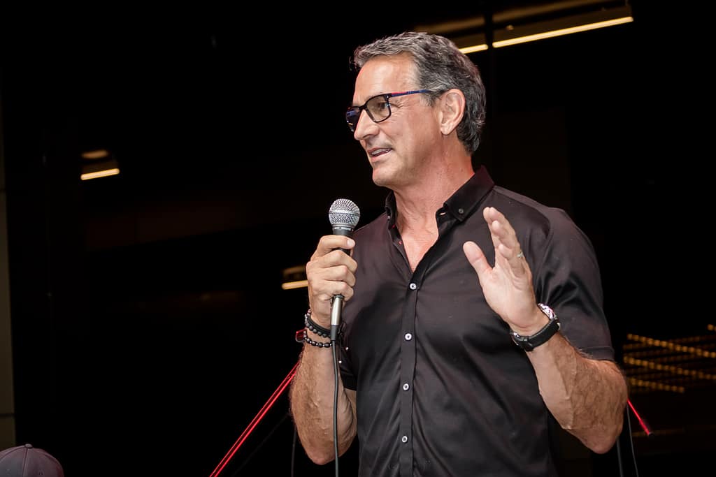 acbr_btb 2021_pre release images _karenimages 2021 - 15 - atlanta's commercial photographer image of an executive on stage at a corporate event sponsored by the atlanta commercial board of realtors by corporate event photographer karen burns