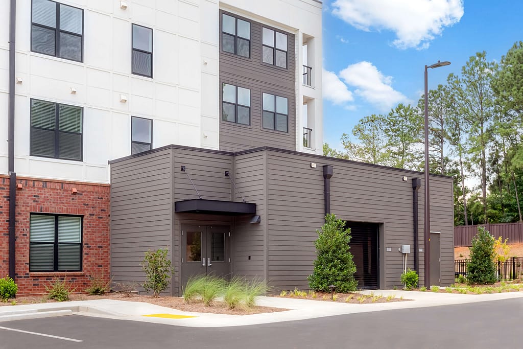 08 - mcshane_the veranda at assembly - atlanta's commercial photographer an exterior of the veranda at assembly photographed a kitchen in a one bedroom model home at crofthouse photographed by architectural photographer karen images