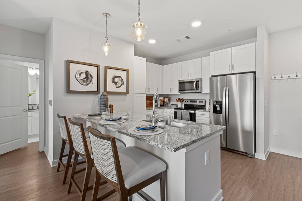 58 - oslo_two bedroom_mcshane construction_karen images 2024 -_ - atlanta's commercial photographer a breakfast bar in a two bedroom apartment at oslo by architectural photographer karen images