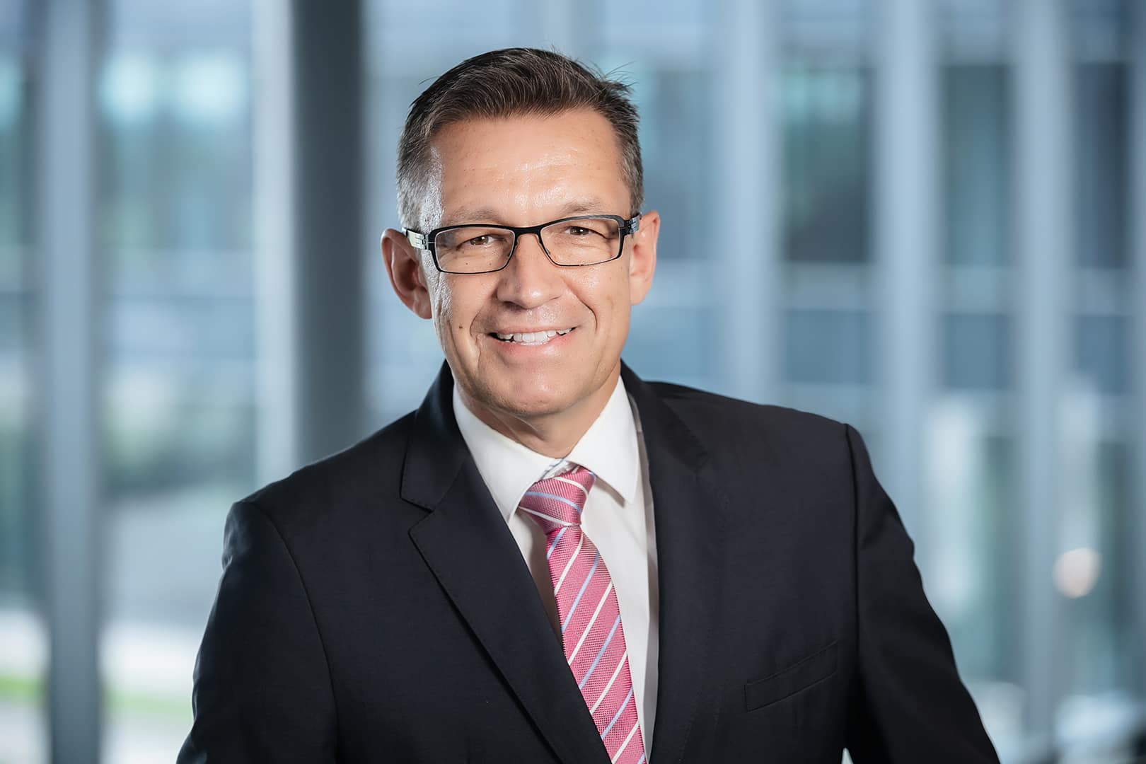 volker reichhardt_pfs_karen images 2022 - 19 - atlanta's commercial photographer executive corporate headshot of an executive photographed on location at one porsche drive by corporate headshot photographer karen images