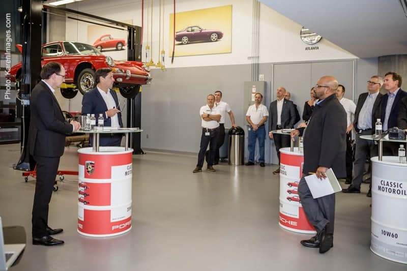 porsche corporate event 03 - atlanta's commercial photographer an image of a presentation in the classic car restoration center at one porsche drive in atlanta photographed by corporate event photographer karen images